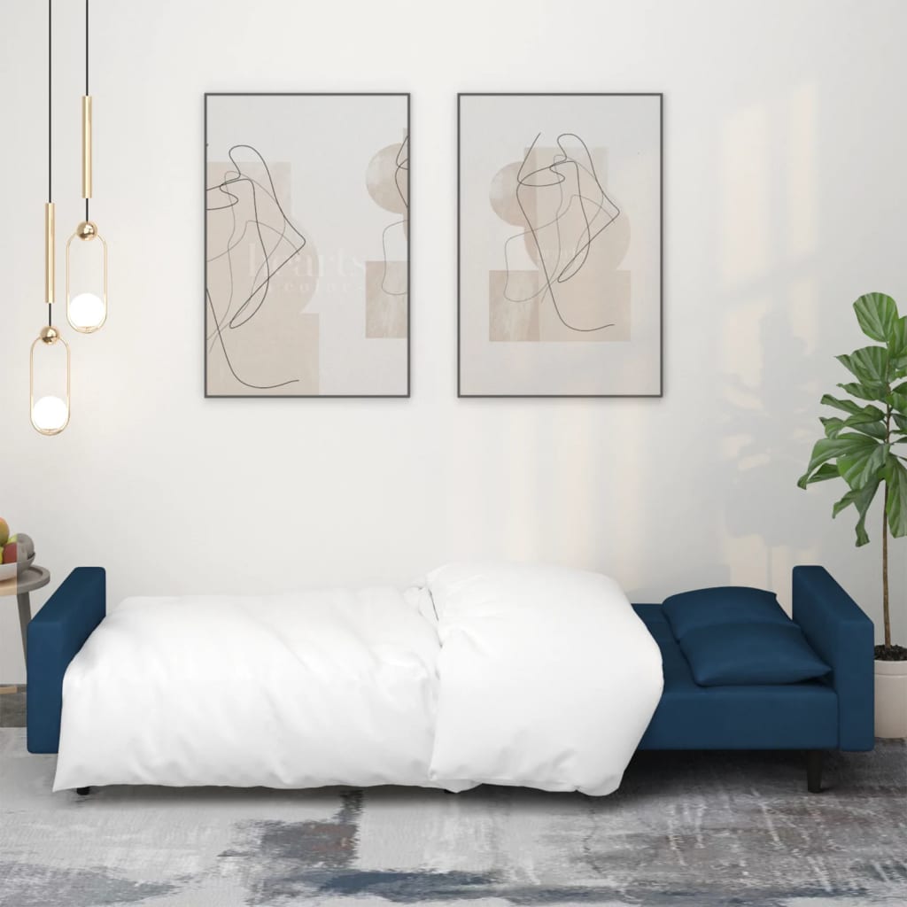 Canapé-lit à 2 places avec deux oreillers bleu velours