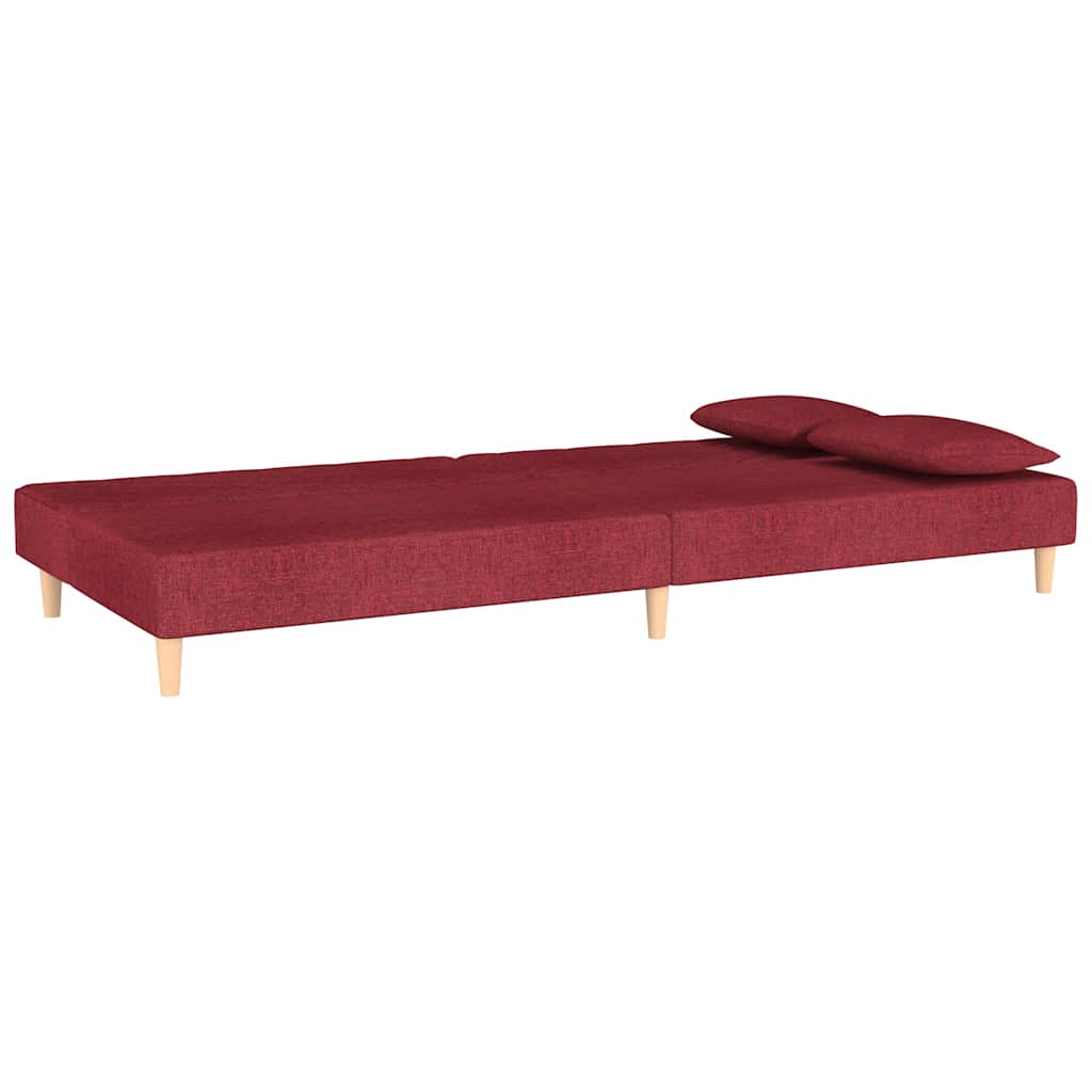 Canapé-lit à 2 places avec deux oreillers rouge bordeaux tissu