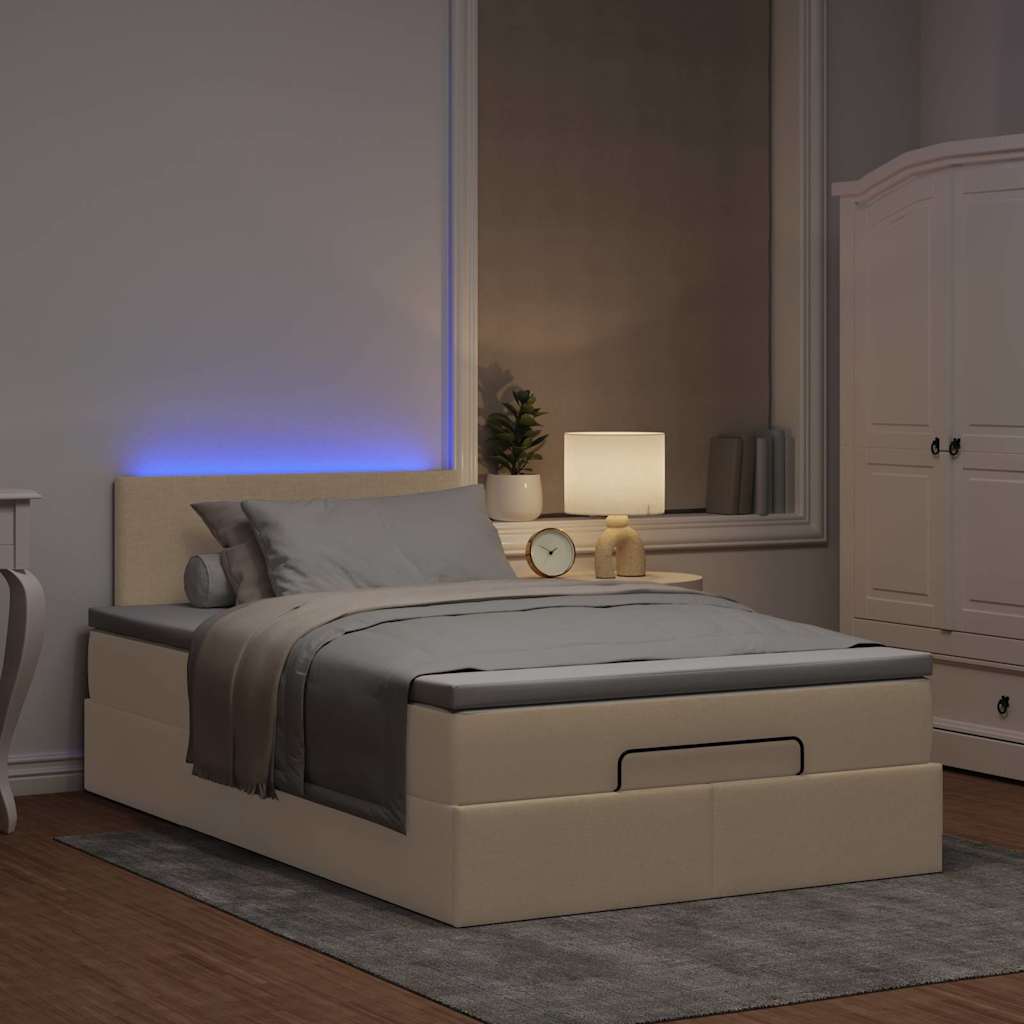 Lit ottoman avec matelas et LED crème 120x190 cm tissu - XIOS