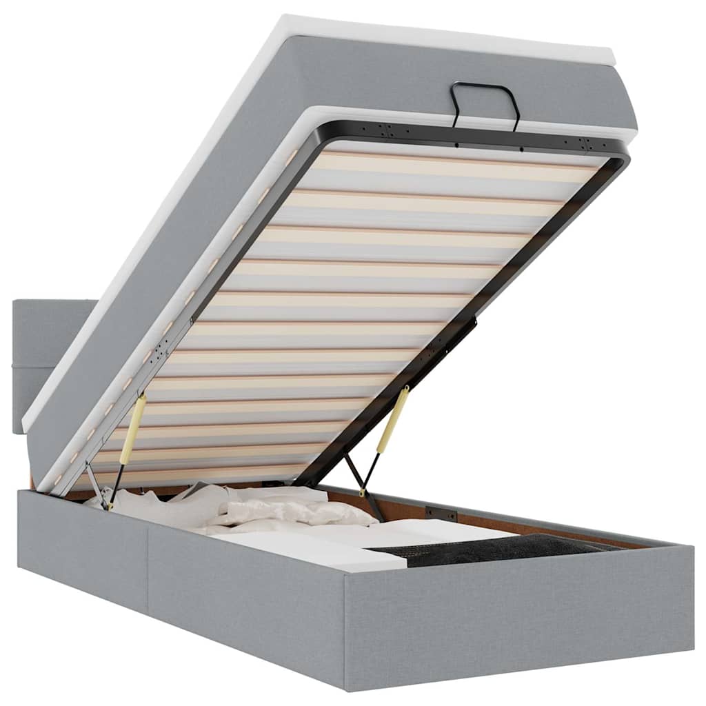 Lit ottoman avec matelas et LED gris clair 90x200 cm tissu
