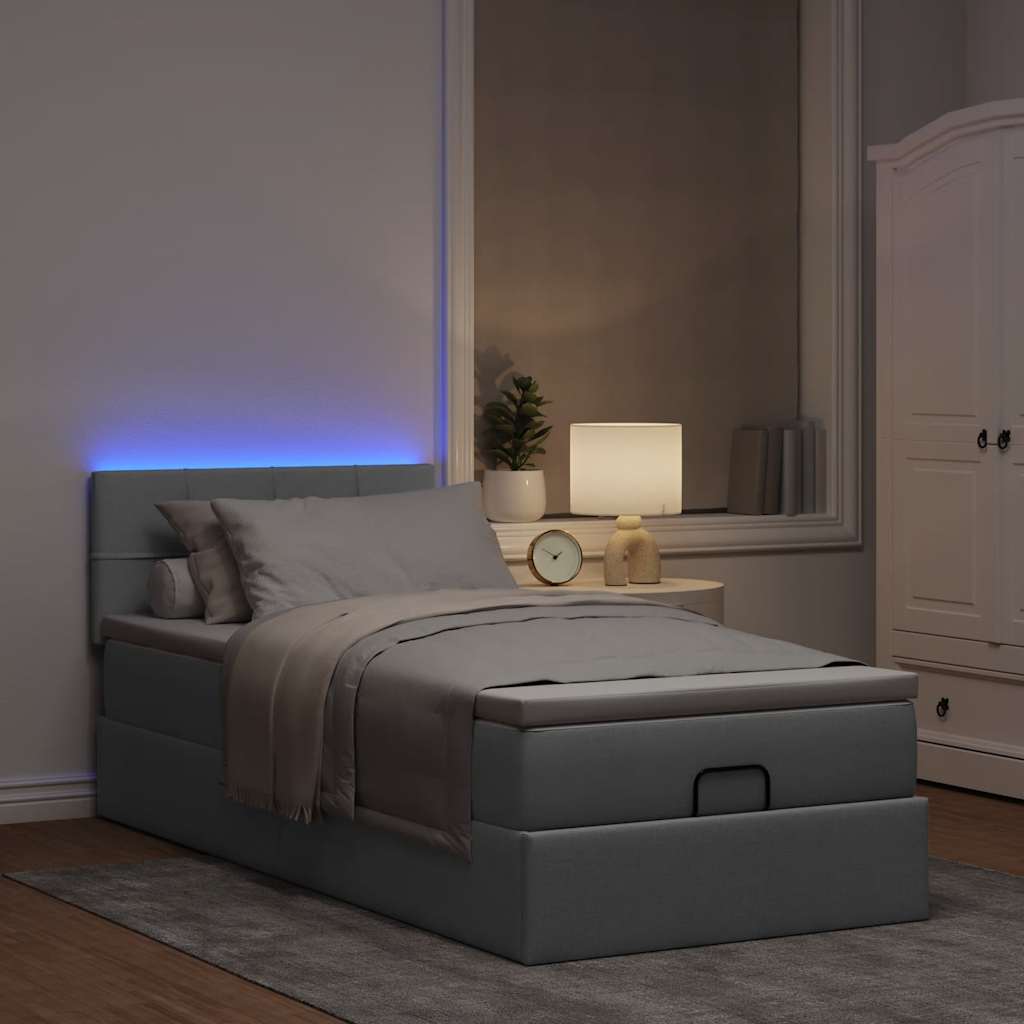 Lit ottoman avec matelas et LED gris clair 90x200 cm tissu - XIOS