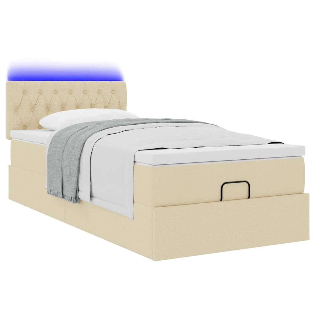 Lit ottoman avec matelas et LED crème 90x200 cm tissu - XIOS