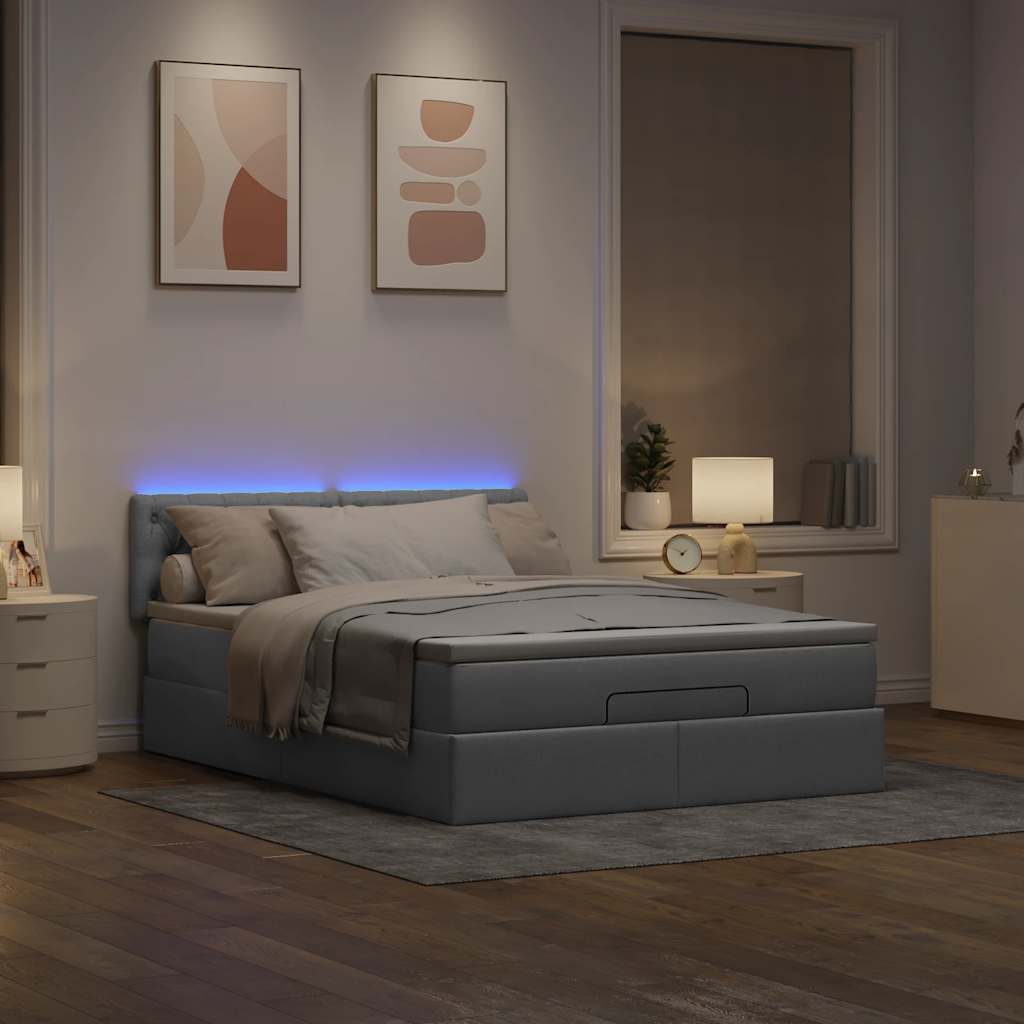 Lit ottoman avec matelas et LED gris clair 140x190 cm tissu - XIOS