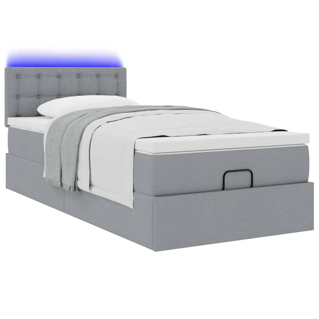 Lit ottoman avec matelas et LED gris clair 90x200 cm tissu - XIOS