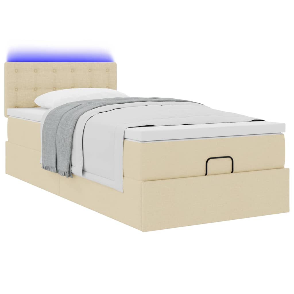 Lit ottoman avec matelas et LED crème 90x200 cm tissu - XIOS