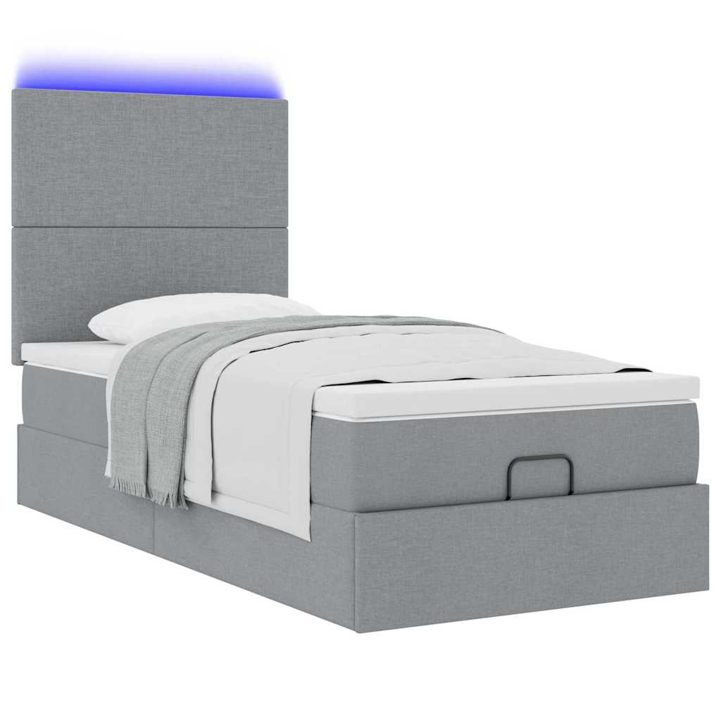 Lit ottoman avec matelas et LED gris clair 90x200 cm tissu - XIOS