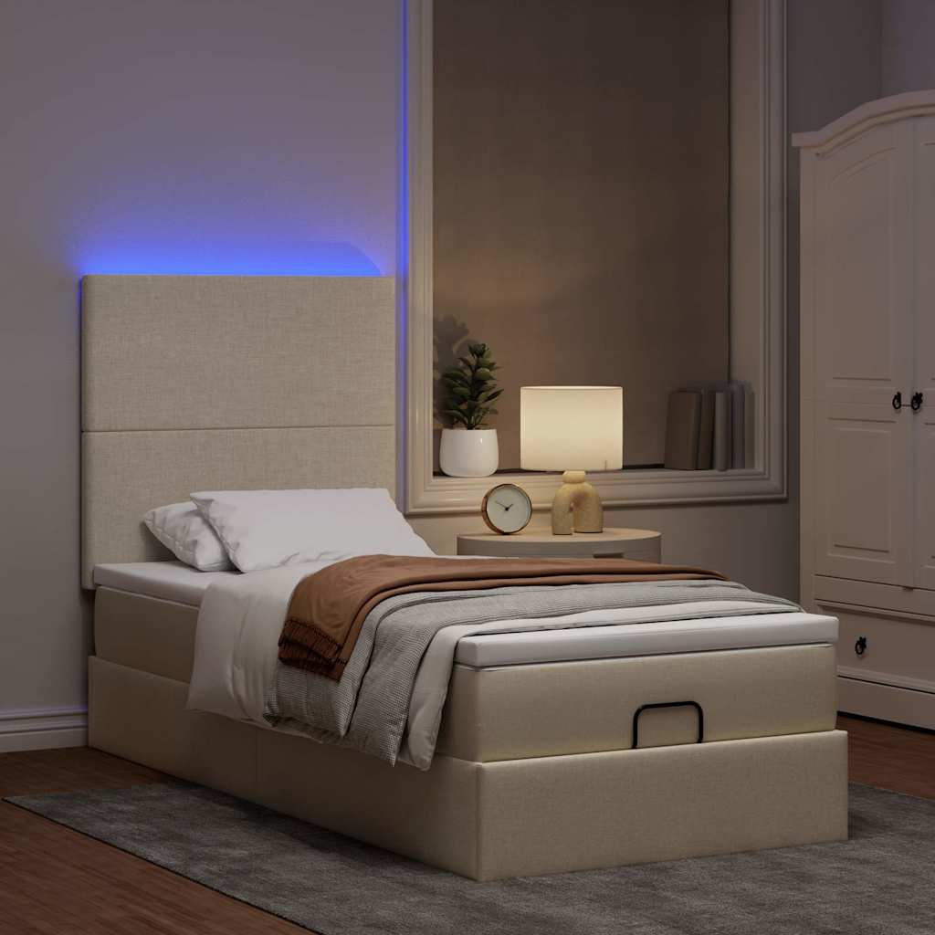 Lit ottoman avec matelas et LED crème 90x200 cm tissu - XIOS