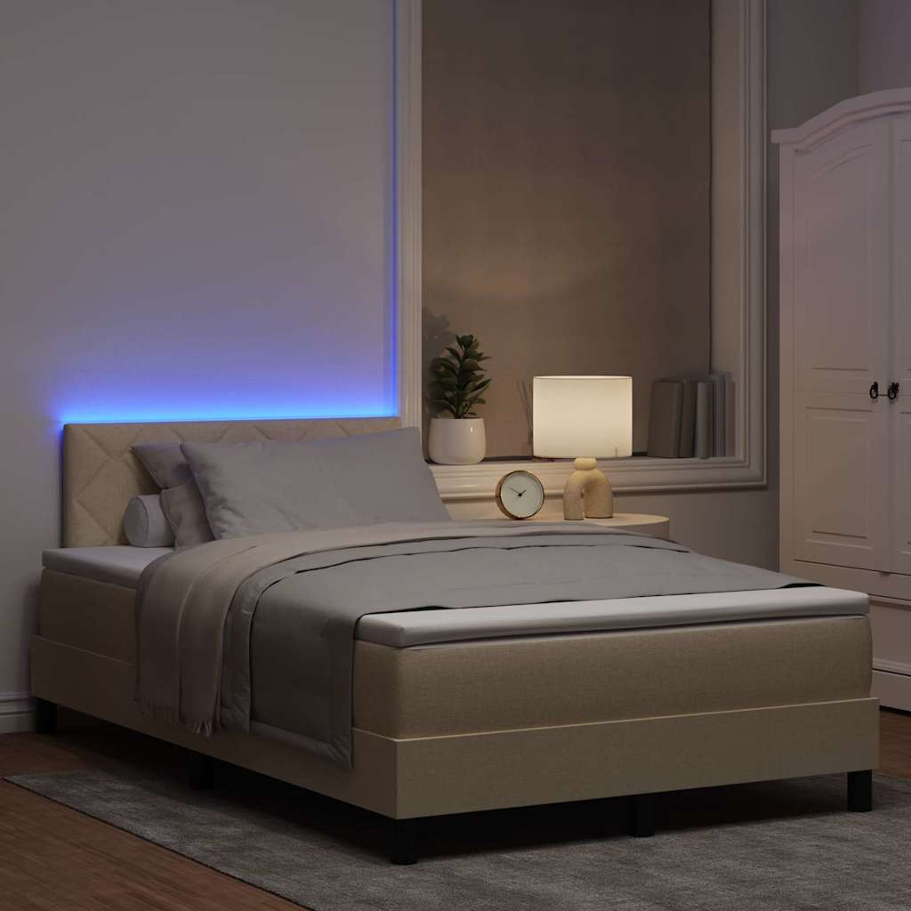 Lit à ressorts avec bandes LED Crème 120 x 190 cm tissu