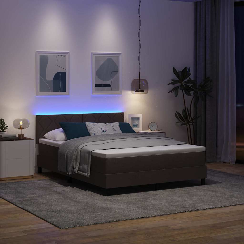 Lit à ressorts avec bandes LED Marron foncé 140 x 200 cm tissu