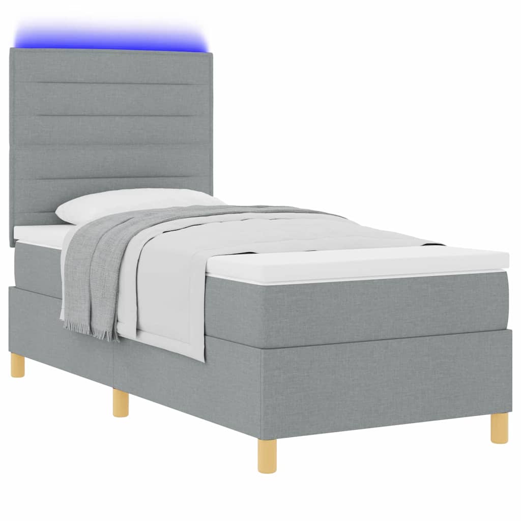 Lit à ressort LED avec matelas Gris clair 100 x 200 cm tissu - XIOS