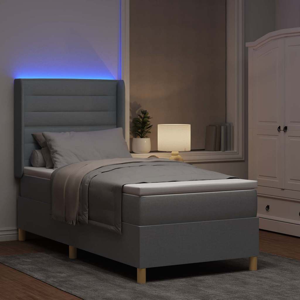 Lit à ressorts avec bandes LED Gris clair 100 x 200 cm tissu - XIOS