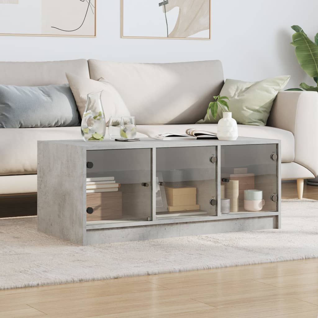 Table basse avec portes en verre gris béton 102x50x42 cm - XIOS