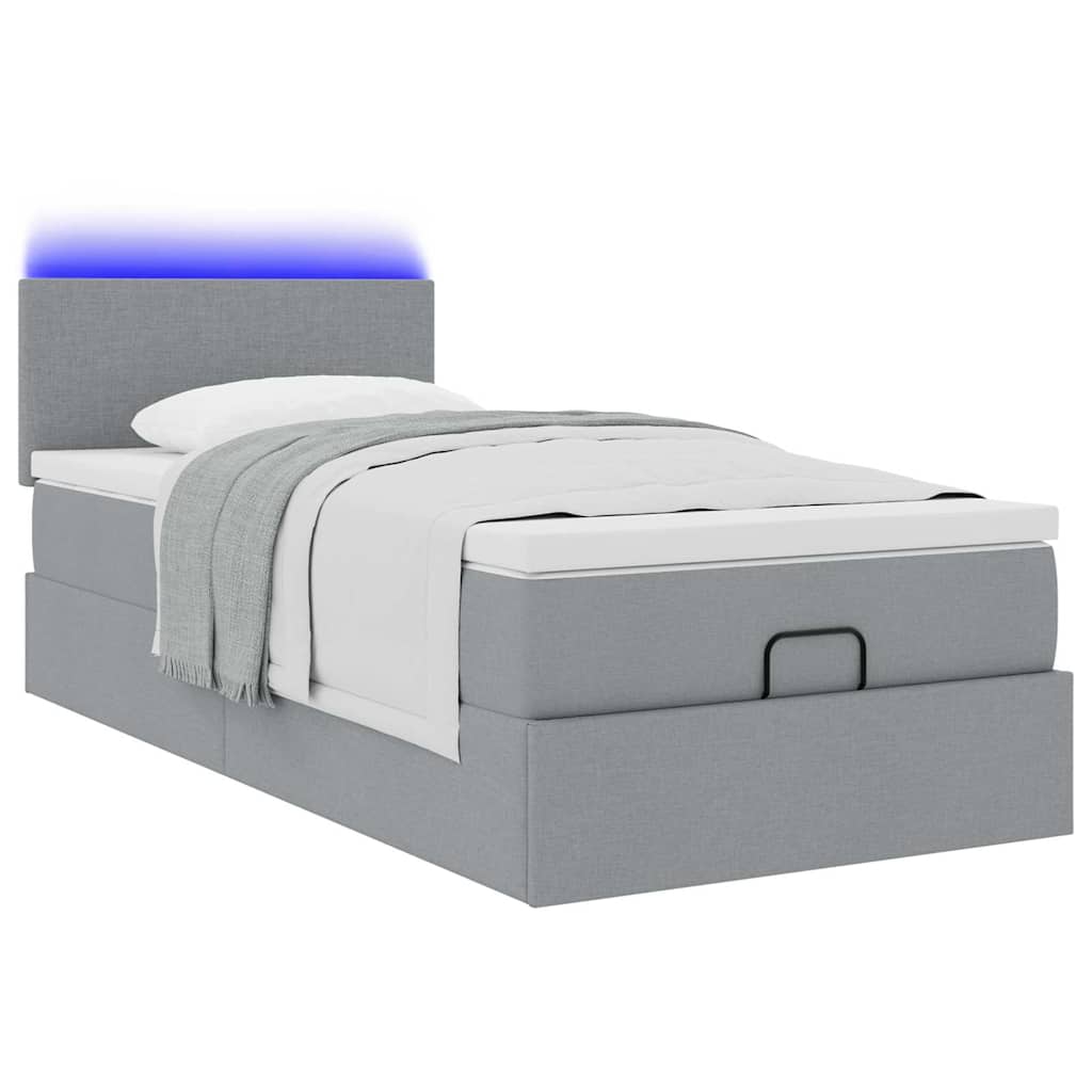 Lit ottoman avec matelas et LED gris clair 90x200 cm tissu - XIOS