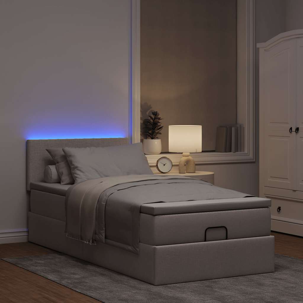 Lit ottoman avec matelas et LED taupe 90x200 cm tissu - XIOS