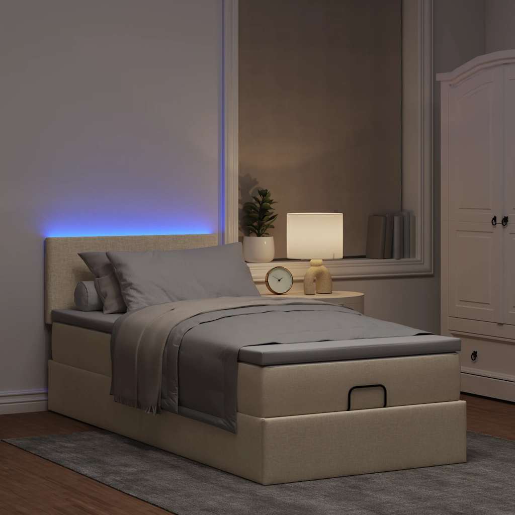 Lit ottoman avec matelas et LED crème 90x200 cm tissu - XIOS