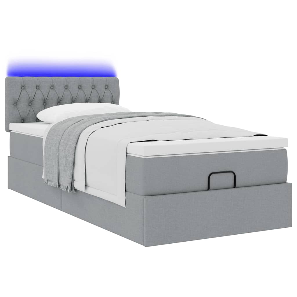 Lit ottoman avec matelas gris clair 100x200 cm tissu - XIOS