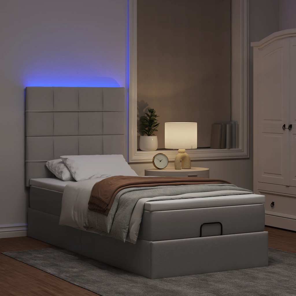 Lit ottoman avec matelas et LED taupe 90x200 cm tissu - XIOS