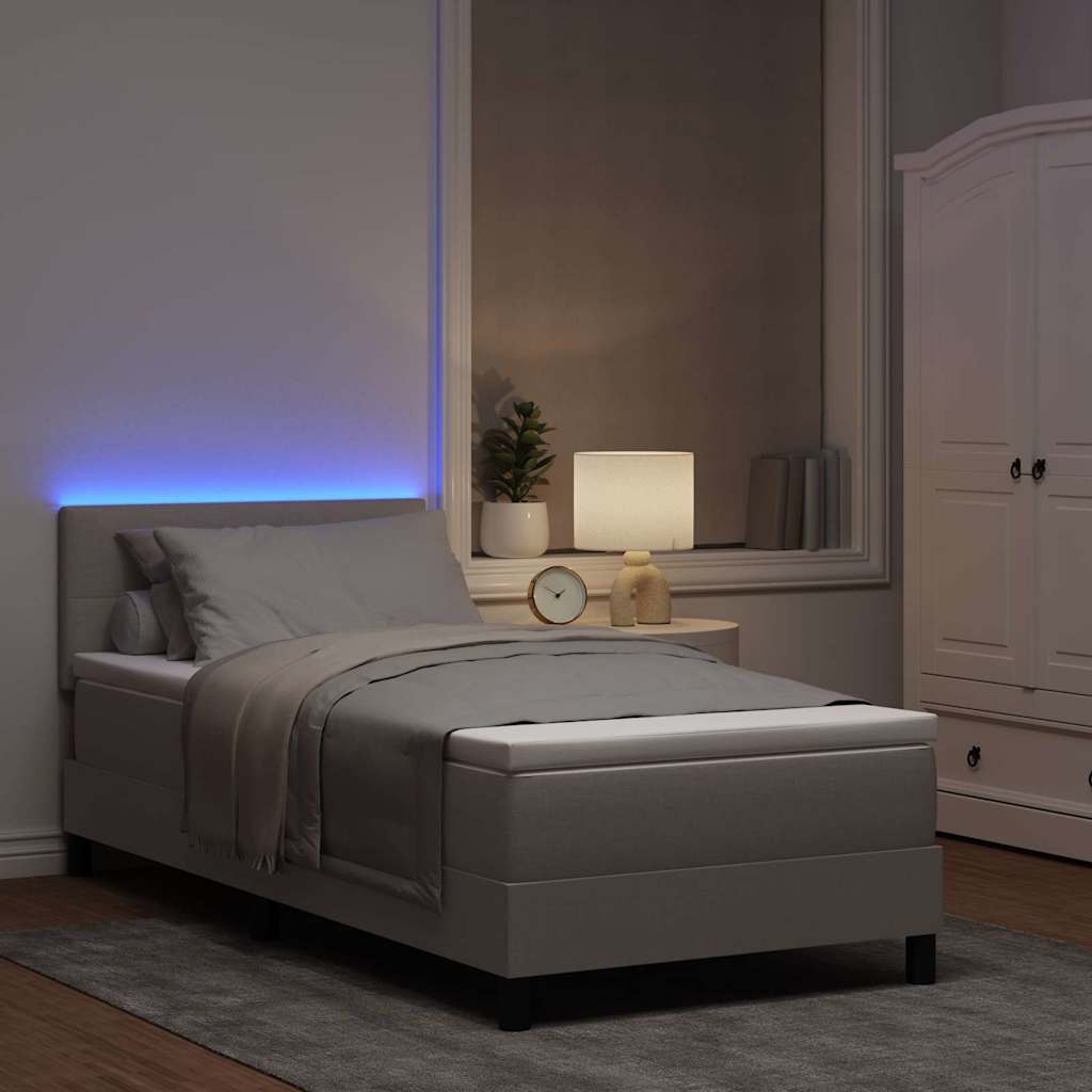 Lit à ressorts avec bandes LED Taupe 100 x 200 cm tissu