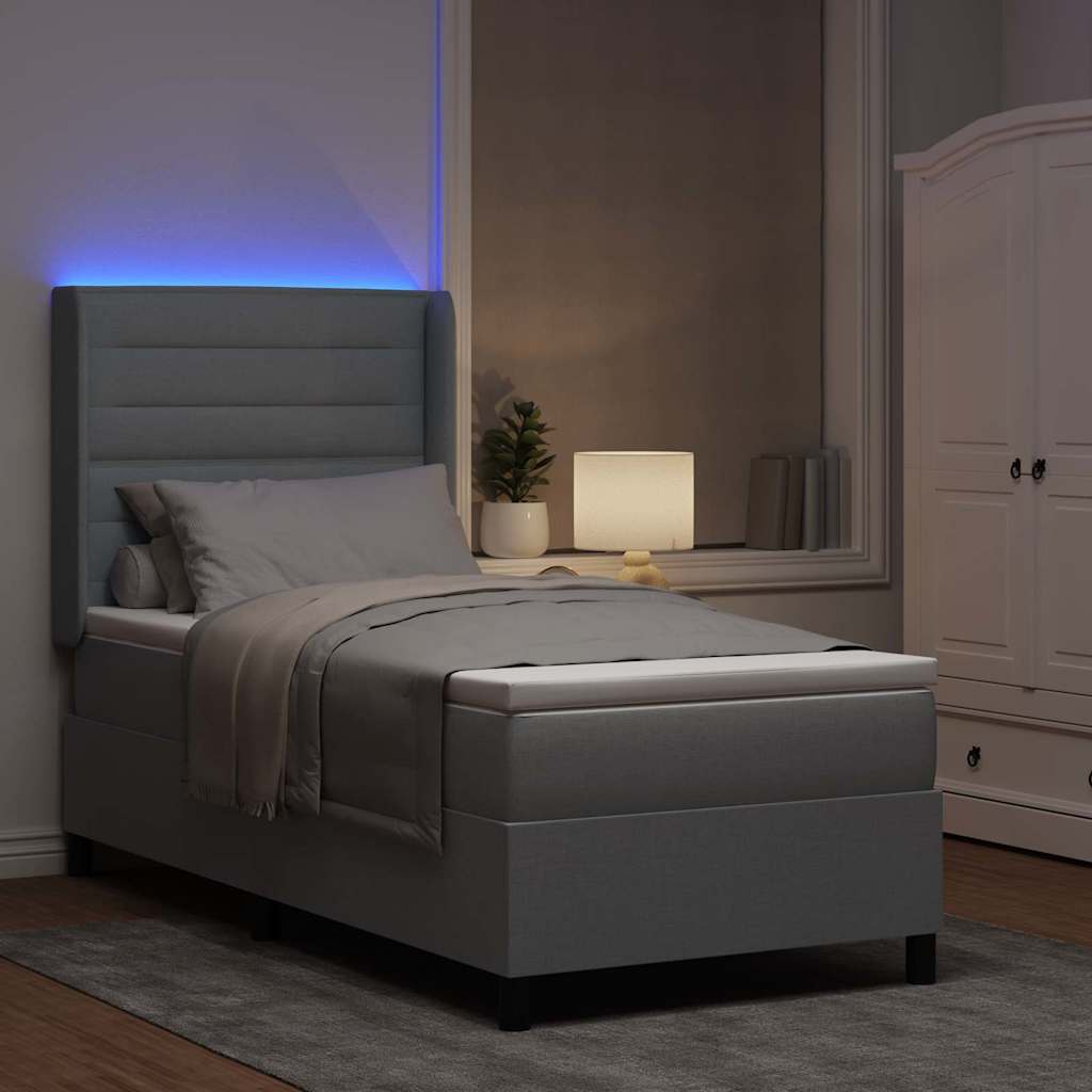 Lit à ressort LED avec matelas Gris clair 80 x 200 cm tissu - XIOS
